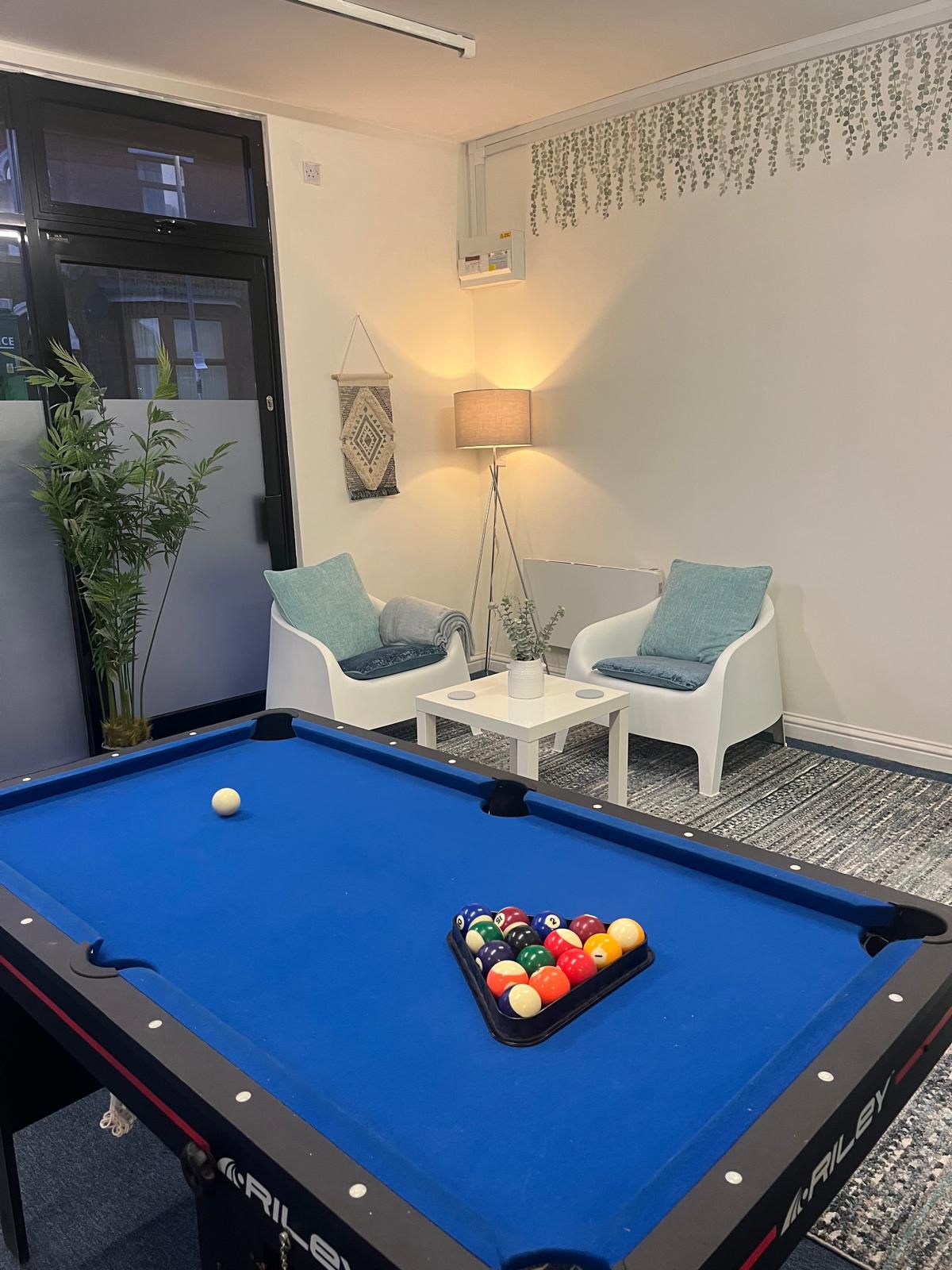Pool table and chairs
